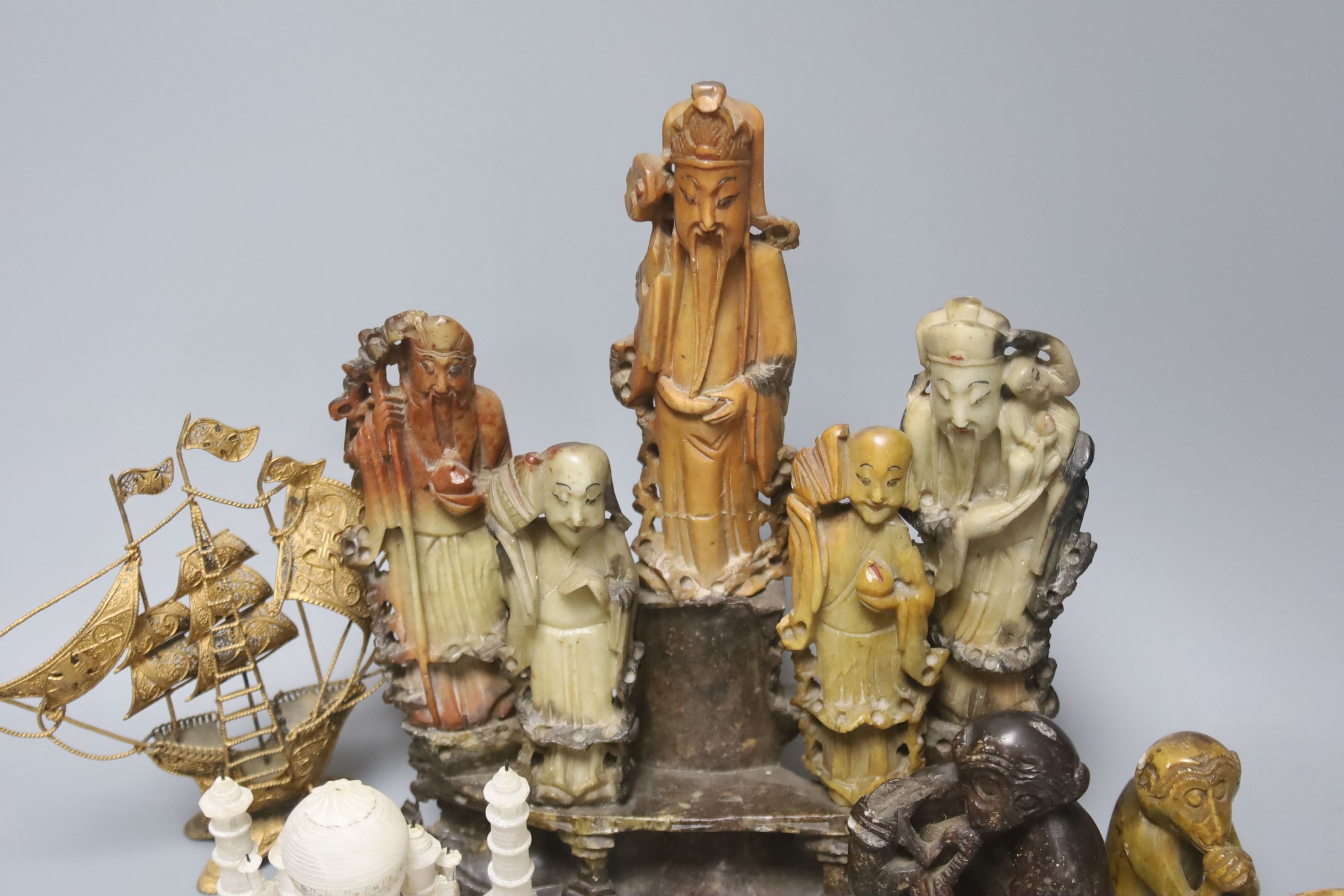 A group of Chinese soapstone carvings, an Indian Alabaster model of the Taj Mahal etc, tallest 23.5 cm